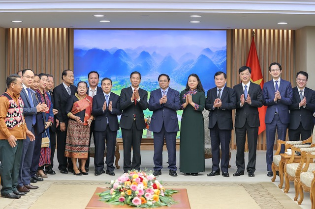 Thủ tướng Phạm Minh Chính và đoàn công tác Ủy ban Trung ương Mặt trận Lào xây dựng đất nước tại buổi tiếp - Ảnh: VGP/Nhật Bắc