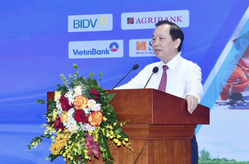 Phó Thống đốc NHNN Đào Minh Tú phát biểu tại Hội thảo “Tăng khả năng hấp thụ vốn cho doanh nghiệp” hôm 21/7 (Ảnh: SBV)
