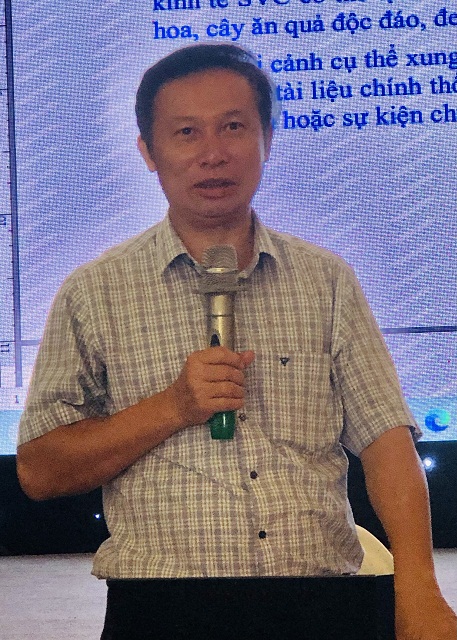PGS-TS Đặng Văn Đông trình bày báo cáo đề dẫn.