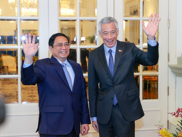 Thủ tướng Lý Hiển Long nhiệt liệt chào mừng Thủ tướng Phạm Minh Chính thăm chính thức Singapore vào tháng 2/2023 - Ảnh: VGP/Nhật Bắc
