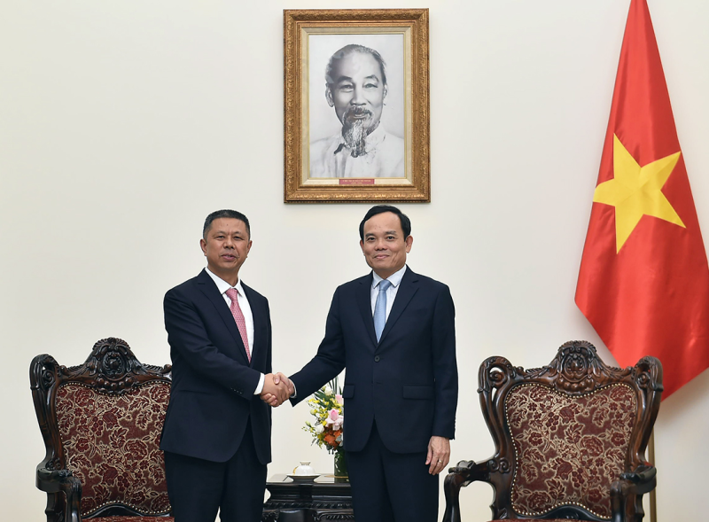 Phó Thủ tướng Trần Lưu Quang tiếp Chủ tịch Tập đoàn Trina Solar - Ảnh: VGP/Hải Minh