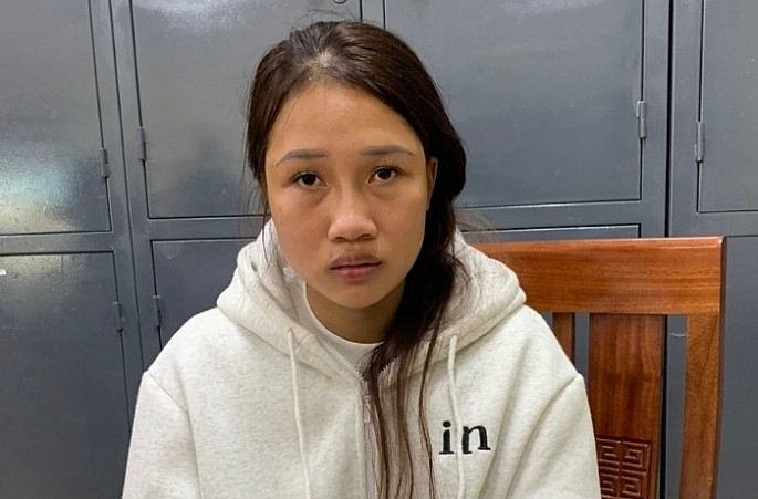 Nghi phạm B&ugrave;i Thị Trang tại cơ quan c&ocirc;ng an