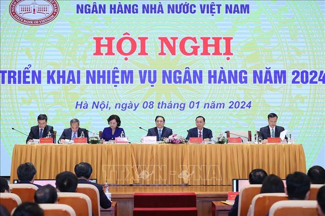 Thủ tướng Phạm Minh Chính dự Hội nghị triển khai nhiệm vụ ngành Ngân hàng. Ảnh: Dương Giang/TTXVN