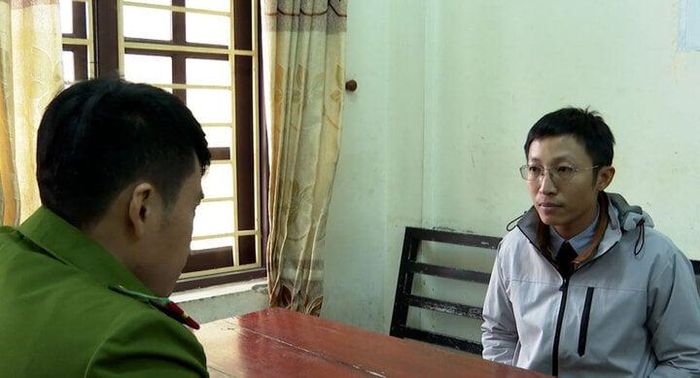 Nguyễn Thanh Tùng tại cơ quan công an. Ảnh: CATB