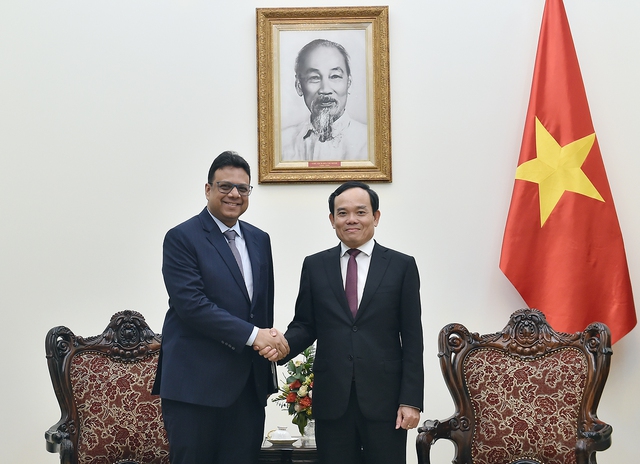 Phó Thủ tướng Trần Lưu Quang và ông Nitin Darbari, Phó Chủ tịch cấp cao Tập đoàn P&G khu vực - Ảnh: VGP/Hải Minh