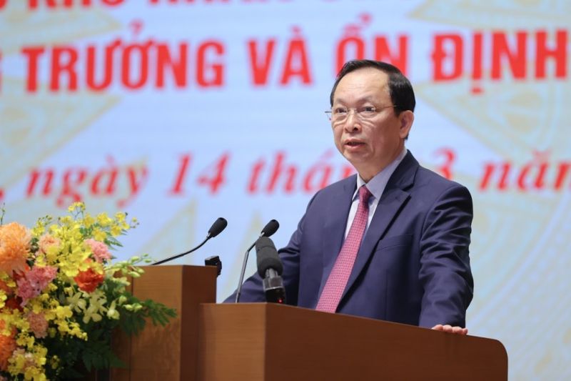 Phó Thống đốc NHNN Đào Minh Tú báo cáo tại hội nghị - Ảnh VGP/Nhật Bắc