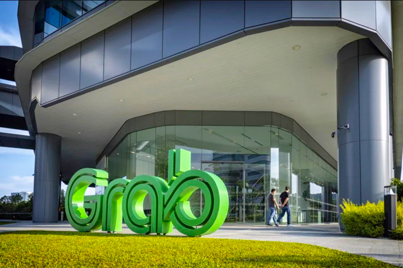 Grab là một công ty công nghệ có trụ sở chính tại Singapore. Ảnh: KT