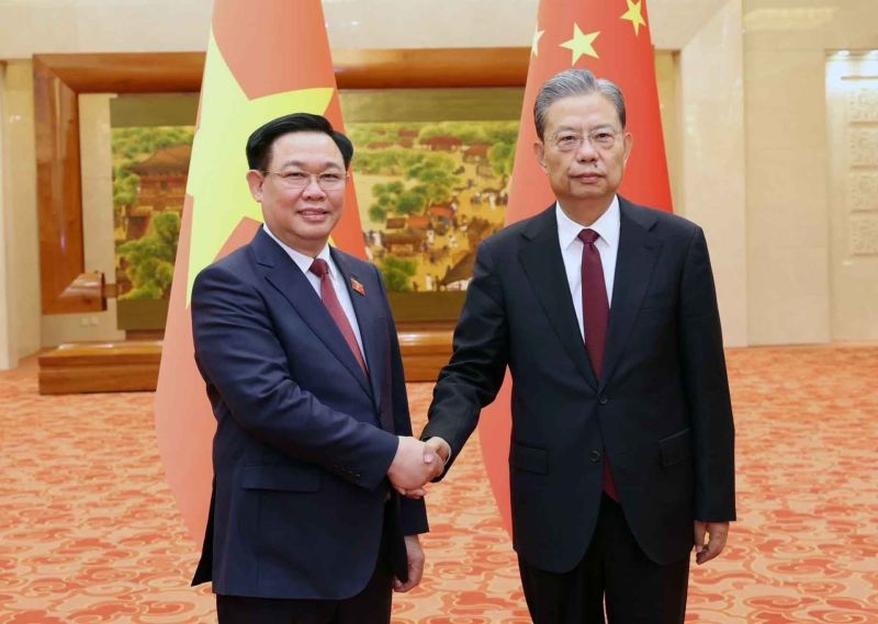 Chủ tịch Quốc hội Vương Đình Huệ và Ủy viên trưởng Ủy ban Thường vụ Nhân đại toàn quốc Trung Quốc Triệu Lạc Tế. (Nguồn: TTXVN)
