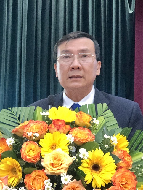 Ông Phạm Văn Nam trình bày Báo cáo tại Hội nghị. Ảnh: V.H