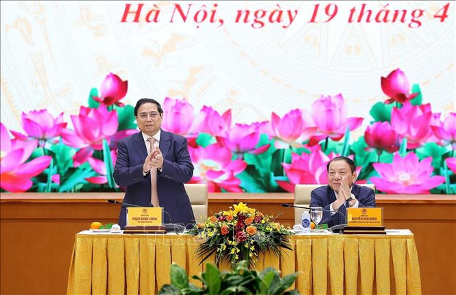 Thủ tướng Phạm Minh Chính gặp mặt đoàn đại biểu già làng, trưởng bản, nghệ nhân và người có uy tín tiêu biểu. Ảnh: Dương Giang/TTXVN