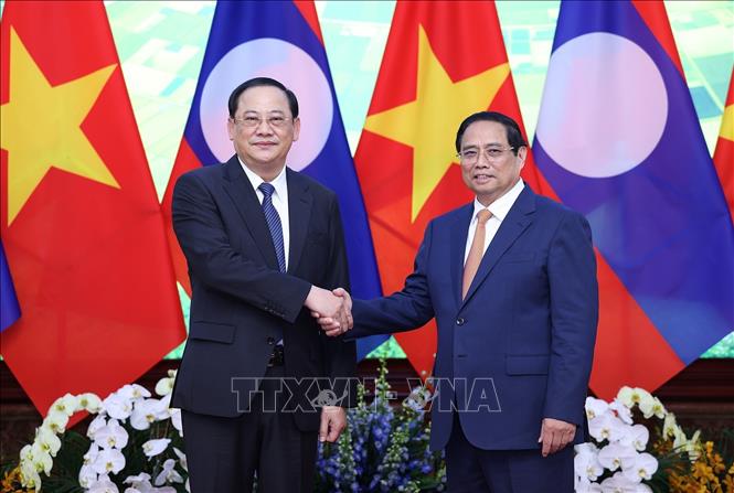 Thủ tướng Phạm Minh Chính đón Thủ tướng Lào Sonexay Siphandone.