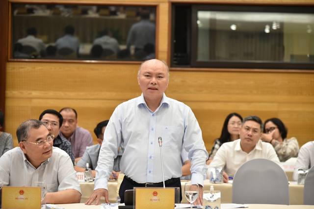 Chánh văn phòng Bộ Nội vụ Vũ Đăng Minh trả lời câu hỏi của phóng viên tại họp báo - Ảnh: VGP/Tuấn Dũng