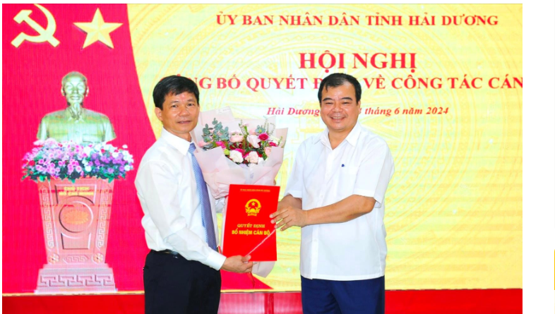 Đồng chí Nguyễn Minh Hùng, Phó Chủ tịch UBND tỉnh Hải Dương trao quyết định bổ nhiệm cho đồng chí Đỗ Huy Chính.