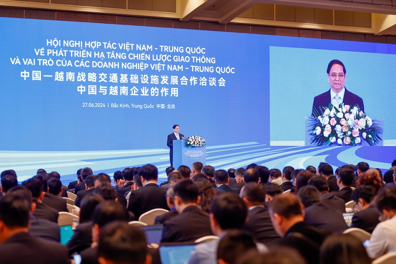 Thủ tướng Phạm Minh Chính dự Hội nghị hợp tác Việt Nam-Trung Quốc về phát triển hạ tầng chiến lược giao thông và vai trò của các doanh nghiệp Việt Nam-Trung Quốc - Ảnh: VGP/Nhật Bắc