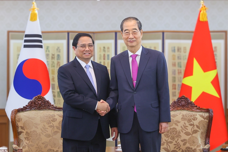 Thủ tướng Chính phủ Phạm Minh Chính và Thủ tướng Han Duck Soo - Ảnh: VGP/Nhật Bắc