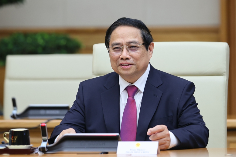 Thủ tướng Phạm Minh Chính nhiệt liệt chào mừng Thủ tướng Pedro Sánchez cùng đoàn đại biểu cấp cao Tây Ban Nha - Ảnh: VGP/Nhật Bắc