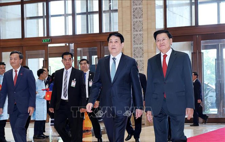 Tổng Bí thư, Chủ tịch nước Lào Thongloun Sisoulith đón Chủ tịch nước Lương Cường dự Giao lưu hữu nghị Việt - Lào với chủ đề “Tình sâu hơn nước Hồng Hà - Cửu Long” - Ảnh: TTXVN Tổng Bí thư, Chủ tịch nước Lào Thongloun Sisoulith đón Chủ tịch nước Lương Cường dự Giao lưu hữu nghị Việt - Lào với chủ đề “Tình sâu hơn nước Hồng Hà - Cửu Long” - Ảnh: TTXVN
