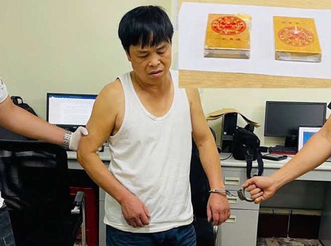 Đức bị bắt khi đang vận chuyển 2 bánh heroin. Ảnh: Công an Cao Bằng