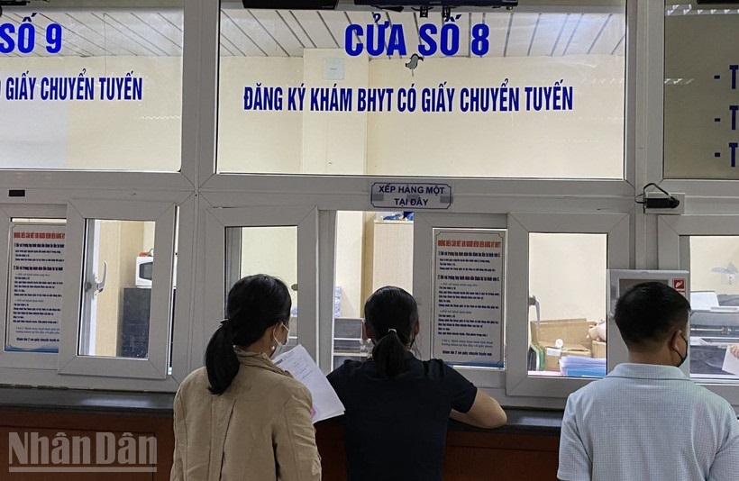 Từ 1/7, người tham gia bảo hiểm y tế 5 năm liên tục được hưởng nhiều quyền lợi. (Ảnh: ĐỖ THOA) Từ 1/7, người tham gia bảo hiểm y tế 5 năm liên tục được hưởng nhiều quyền lợi. (Ảnh: ĐỖ THOA)