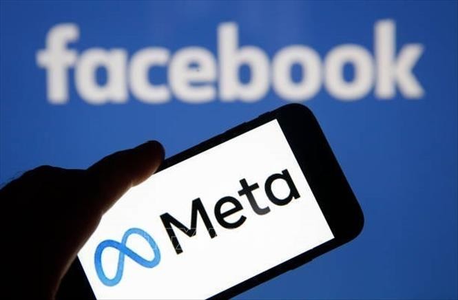 Biểu tượng Meta và Facebook trên màn hình điện thoại thông minh ở Paris, Pháp. Ảnh: Getty Images/TTXVN Biểu tượng Meta và Facebook trên màn hình điện thoại thông minh ở Paris, Pháp. Ảnh: Getty Images/TTXVN