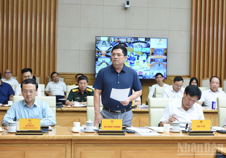 Đại diện lãnh đạo Bộ Quốc phòng phát biểu tại Hội nghị. (Ảnh: TRẦN HẢI)