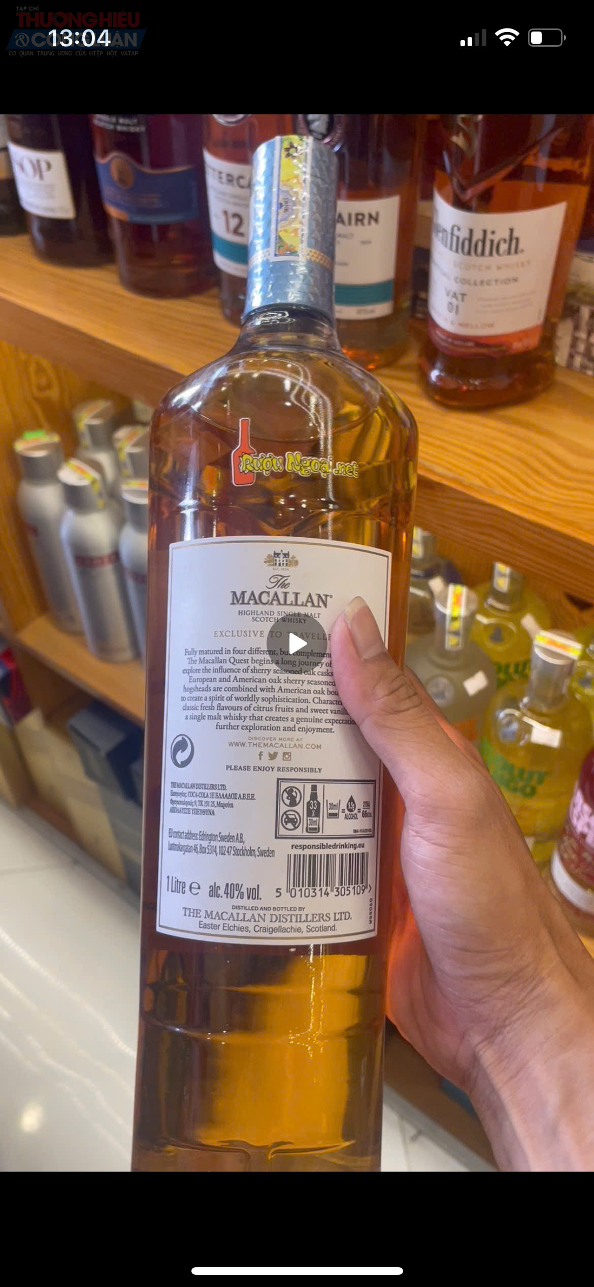 The MACCALLAN Quest có giá 2,250 triệu đồng/chai trắng chỉ có dòng chữ rượu ngoại.net bằng Tiếng Việt The MACCALLAN Quest có giá 2,250 triệu đồng/chai trắng chỉ có dòng chữ rượu ngoại.net bằng Tiếng Việt