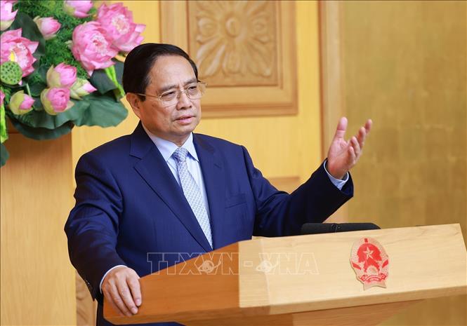 Thủ tướng Phạm Minh Chính phát biểu tại cuộc Tọa đàm với các doanh nghiệp Vương quốc Anh. Ảnh: Dương Giang/TTXVN