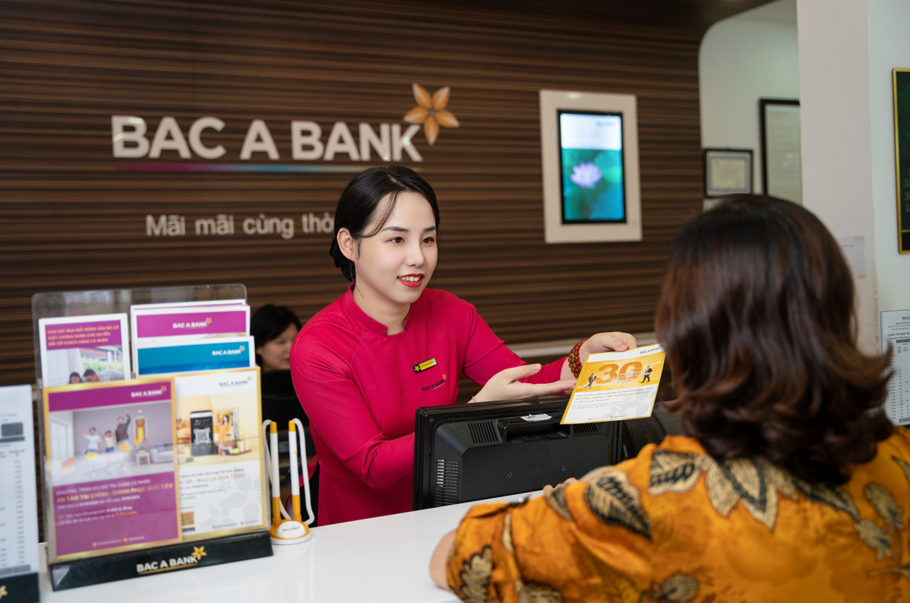 Bac A Bank vừa điều chỉnh giảm lãi suất huy động, với mức giảm 0,1%/năm, áp dụng cho tất cả kỳ hạn từ 1-36 tháng. (Ảnh minh họa) Bac A Bank vừa điều chỉnh giảm lãi suất huy động, với mức giảm 0,1%/năm, áp dụng cho tất cả kỳ hạn từ 1-36 tháng. (Ảnh minh họa)