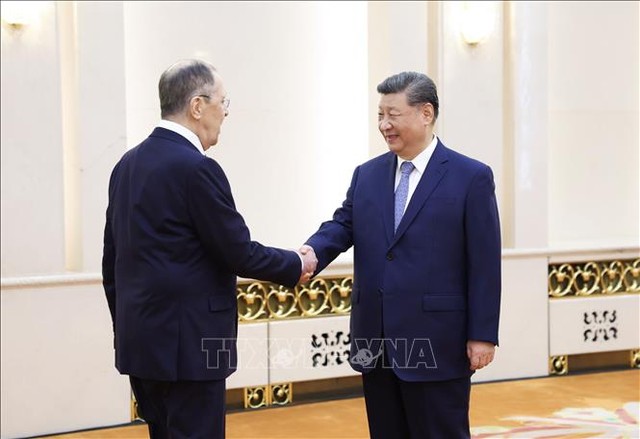 Chủ tịch Trung Quốc Tập Cận Bình (phải) và Ngoại trưởng Nga Sergey Lavrov tại cuộc gặp ở Bắc Kinh ngày 15/7. Ảnh: THX/TTXVN