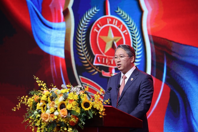 Bộ trưởng Bộ Tư pháp Nguyễn Hải Ninh trình bày diễn văn tại lễ kỷ niệm - Ảnh: VGP/Nhật Bắc