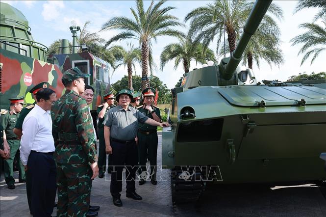 Thủ tướng Phạm Minh Chính tham quan sản phẩm Công nghiệp quốc phòng. Ảnh: Dương Giang/TTXVN Thủ tướng Phạm Minh Chính tham quan sản phẩm Công nghiệp quốc phòng. Ảnh: Dương Giang/TTXVN