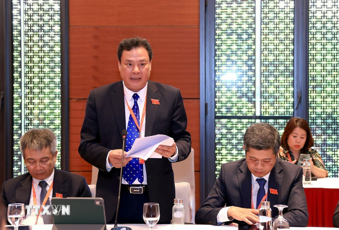 Các đại biểu thảo luận tại tổ số 6 chiều 12/10. (Ảnh: Tuấn Anh/TTXVN) Các đại biểu thảo luận tại tổ số 6 chiều 12/10. (Ảnh: Tuấn Anh/TTXVN)