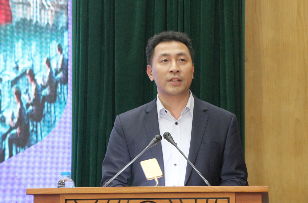 Ông Lê Quang Tuấn, trợ lý chủ nhiệm trưởng bộ phận kinh tế đầu tư, văn phòng kinh tế, văn hóa Việt Nam tại Đài Bắc (Trung Quốc) tham luận tại buổi tọa đàm.