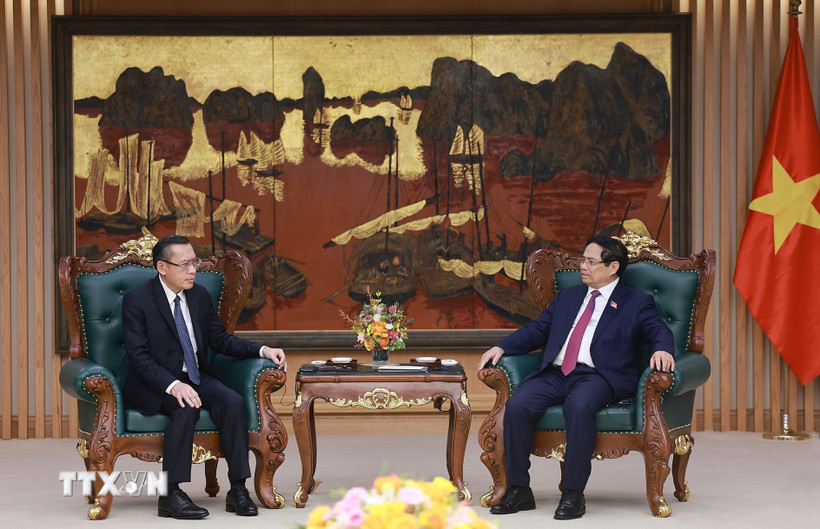 Thủ tướng Phạm Minh Chính tiếp ông Phoxay Sayasone, Bộ trưởng Bộ Lao động và Phúc lợi xã hội Lào. (Ảnh: Dương Giang/TTXVN)