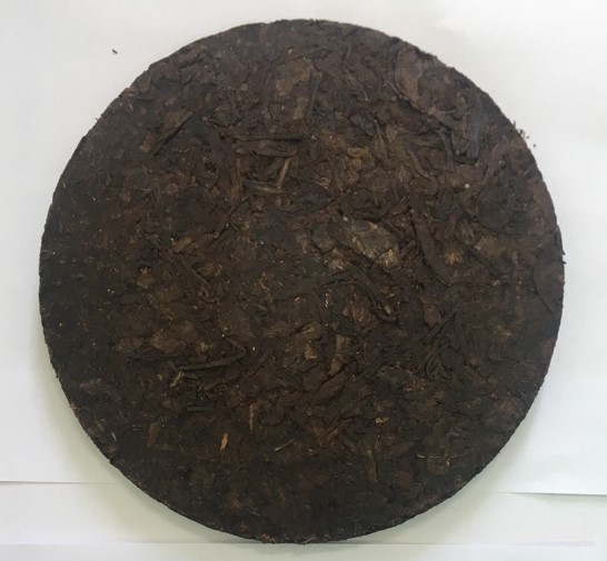 Mẫu chè phổ nhĩ sống Shan tuyết ép bánh Mẫu chè phổ nhĩ sống Shan tuyết ép bánh