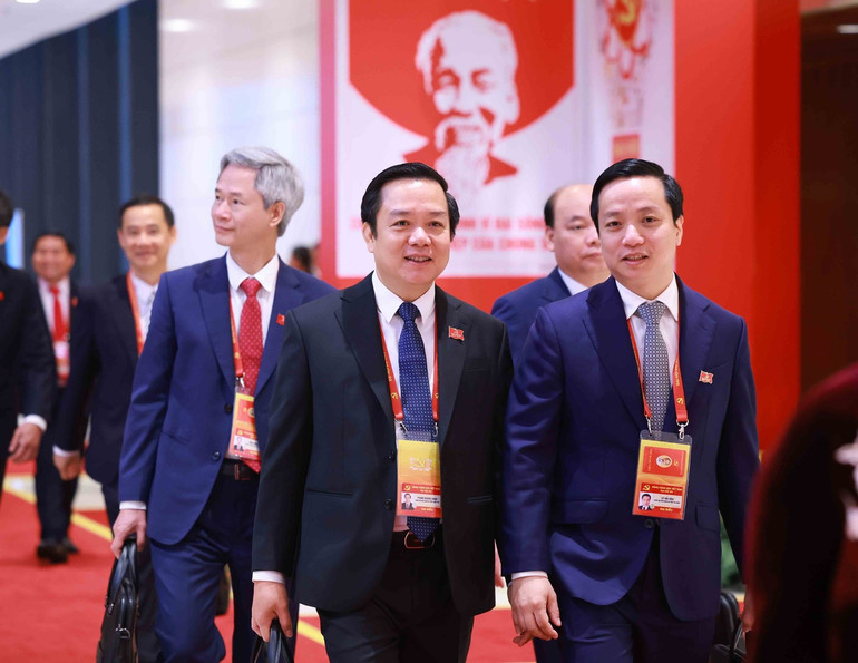 Các đại biểu đến dự Đại hội XIV của Đảng. Ảnh: TTXVN