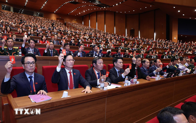 Đại hội biểu quyết th&ocirc;ng qua số lượng Ủy vi&ecirc;n Ban Chấp h&agrave;nh Trung ương Đảng kh&oacute;a XIV. (Ảnh: TTXVN)
