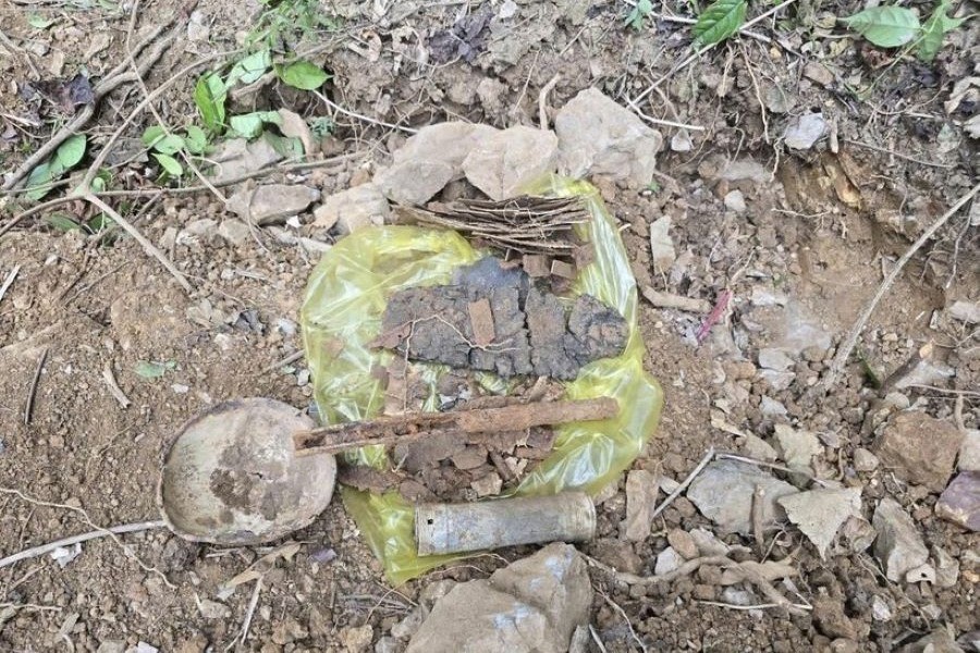 C&aacute;c di vật t&igrave;m thấy c&ugrave;ng với h&agrave;i cốt liệt sĩ