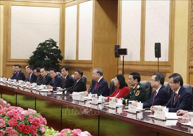 Tổng B&iacute; thư, Chủ tịch nước T&ocirc; L&acirc;m v&agrave; th&agrave;nh vi&ecirc;n Đo&agrave;n cấp cao Việt Nam tại cuộc hội đ&agrave;m với Tổng B&iacute; thư, Chủ tịch nước Trung Quốc Tập Cận B&igrave;nh v&agrave; Đo&agrave;n cấp cao Trung Quốc. Ảnh: Thống Nhất/TTXVN