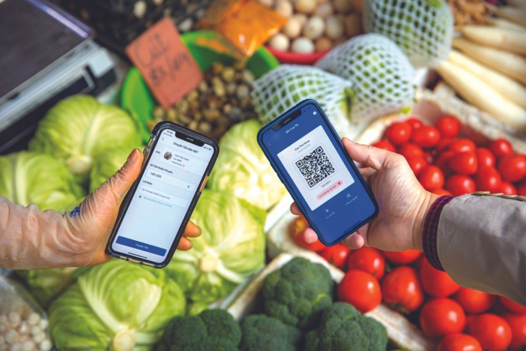 Hà Nội tăng tốc số hóa chợ truyền thống, mở rộng thanh toán QR và bán hàng online