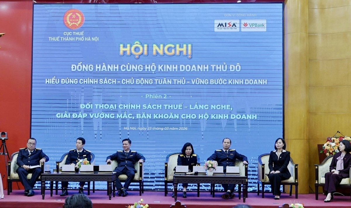 Đại điện Thuế TP. H&agrave; Nội tại Hội nghị đồng h&agrave;nh c&ugrave;ng hộ kinh doanh Thủ đ&ocirc;. Ảnh: TK