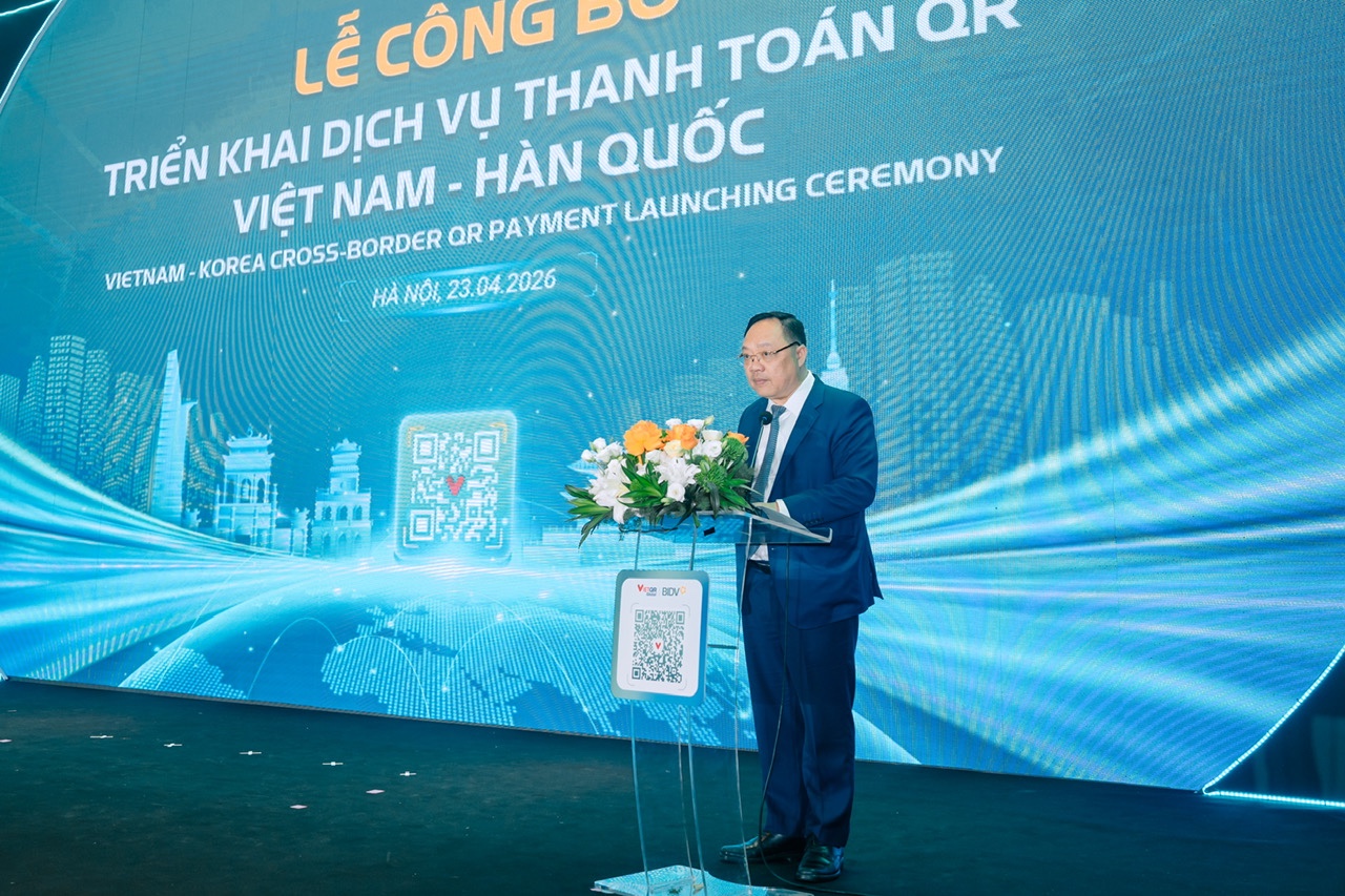 &Ocirc;ng Phạm Anh Tuấn - Vụ trưởng Vụ Thanh to&aacute;n Ng&acirc;n h&agrave;ng Nh&agrave; nước Việt Nam - ph&aacute;t biểu tại sự kiện