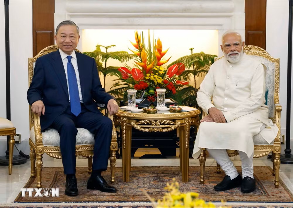 Tổng B&iacute; thư, Chủ tịch nước T&ocirc; L&acirc;m v&agrave; Thủ tướng Ấn Độ Narendra Modi gặp hẹp - Ảnh: TTXVN