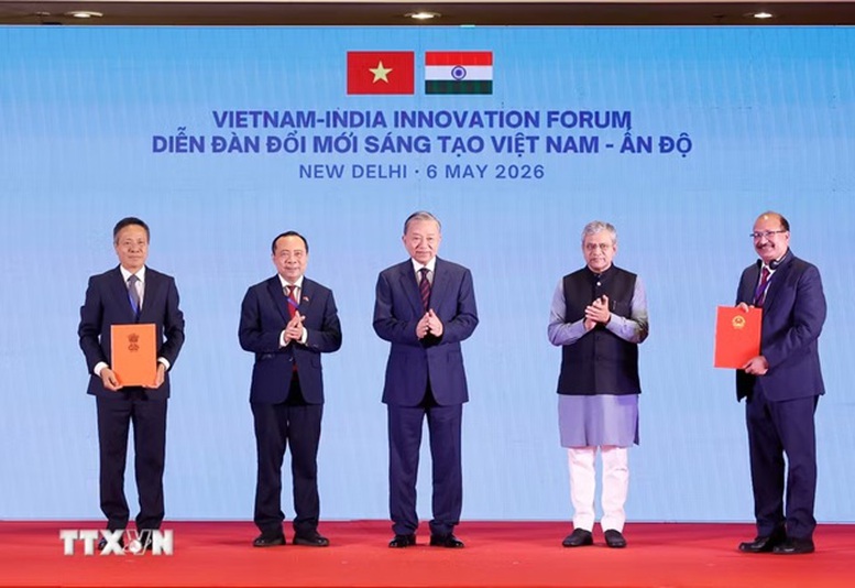 Tổng B&iacute; thư, Chủ tịch nước T&ocirc; L&acirc;m chứng kiến trao c&aacute;c văn kiện, thoả thuận hợp t&aacute;c giữa 2 nước - Ảnh: TTXVN