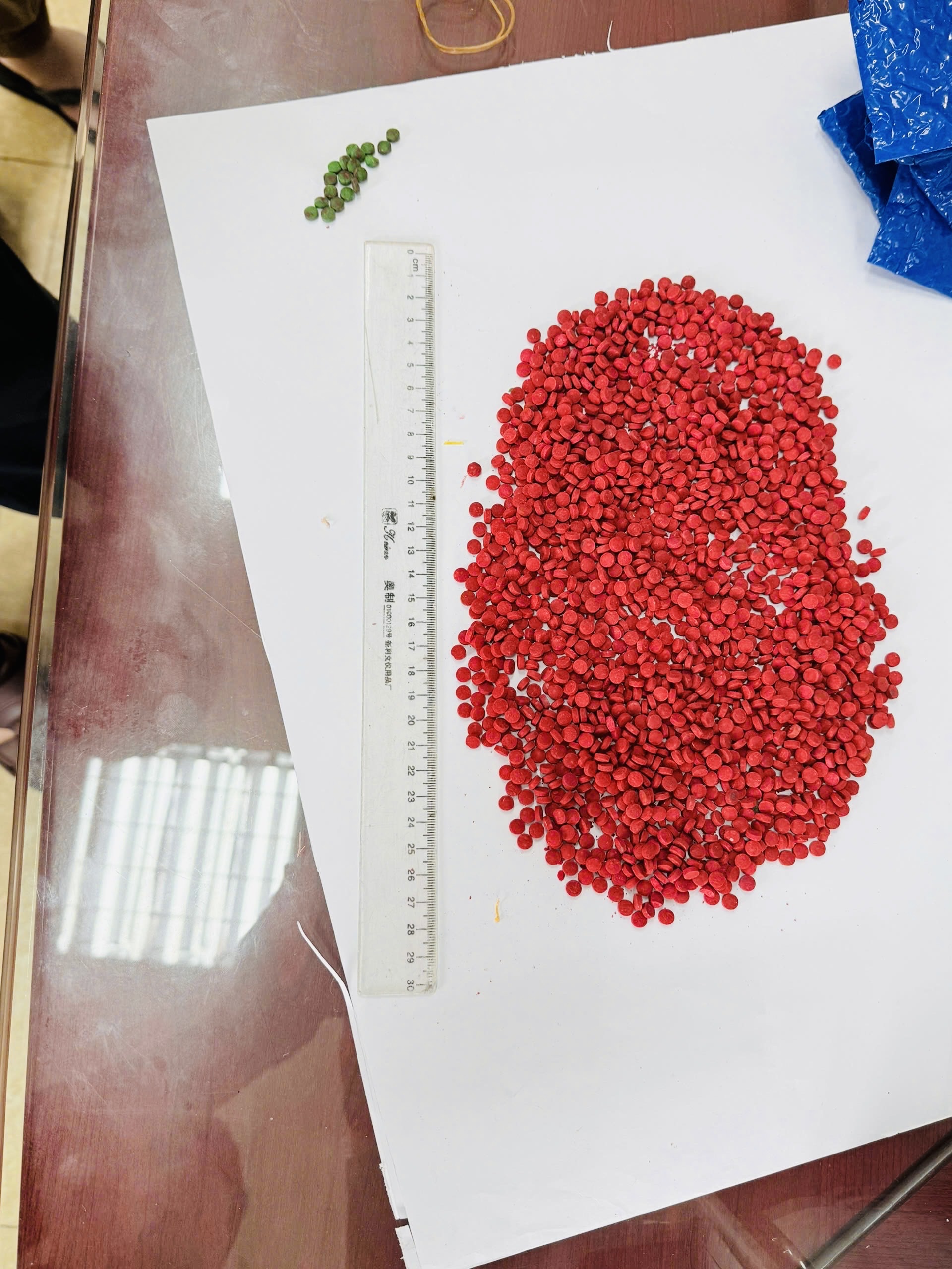 Vật chứng gồm 11.600 viên ma túy hồng phiến Vật chứng gồm 11.600 viên ma túy hồng phiến