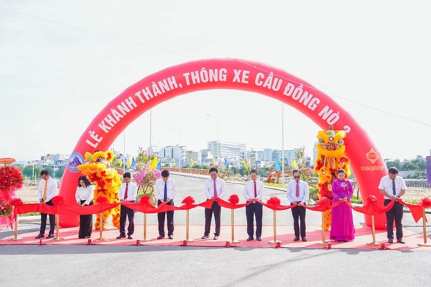 Nghi thức cắt băng kh&aacute;nh th&agrave;nh, th&ocirc;ng xe cầu Đồng N&ograve; 2