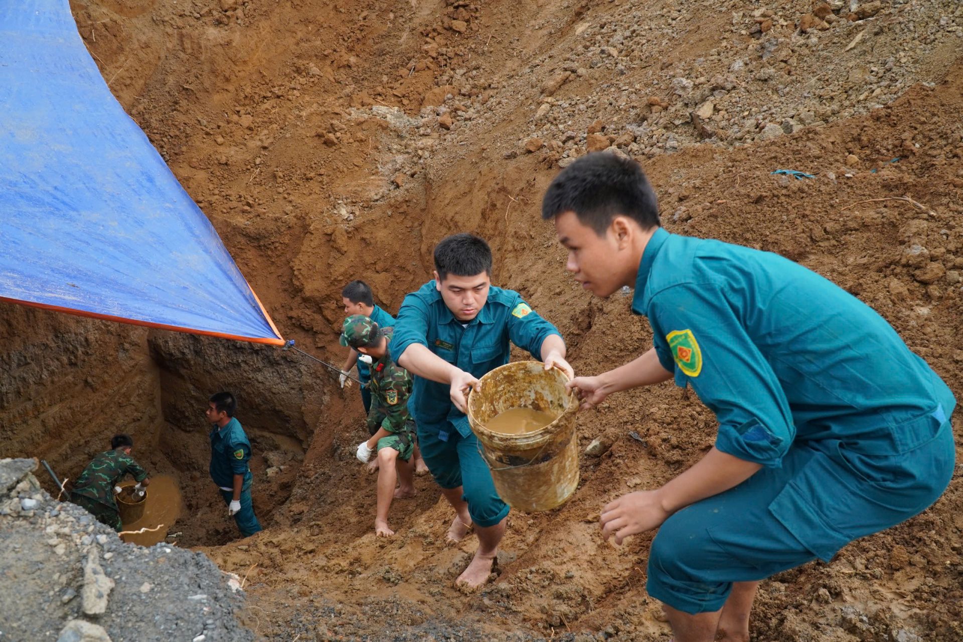 Khu vực giếng nước cũ, nơi lực lượng chức năng ph&aacute;t hiện ba bộ h&agrave;i cốt liệt sĩ.