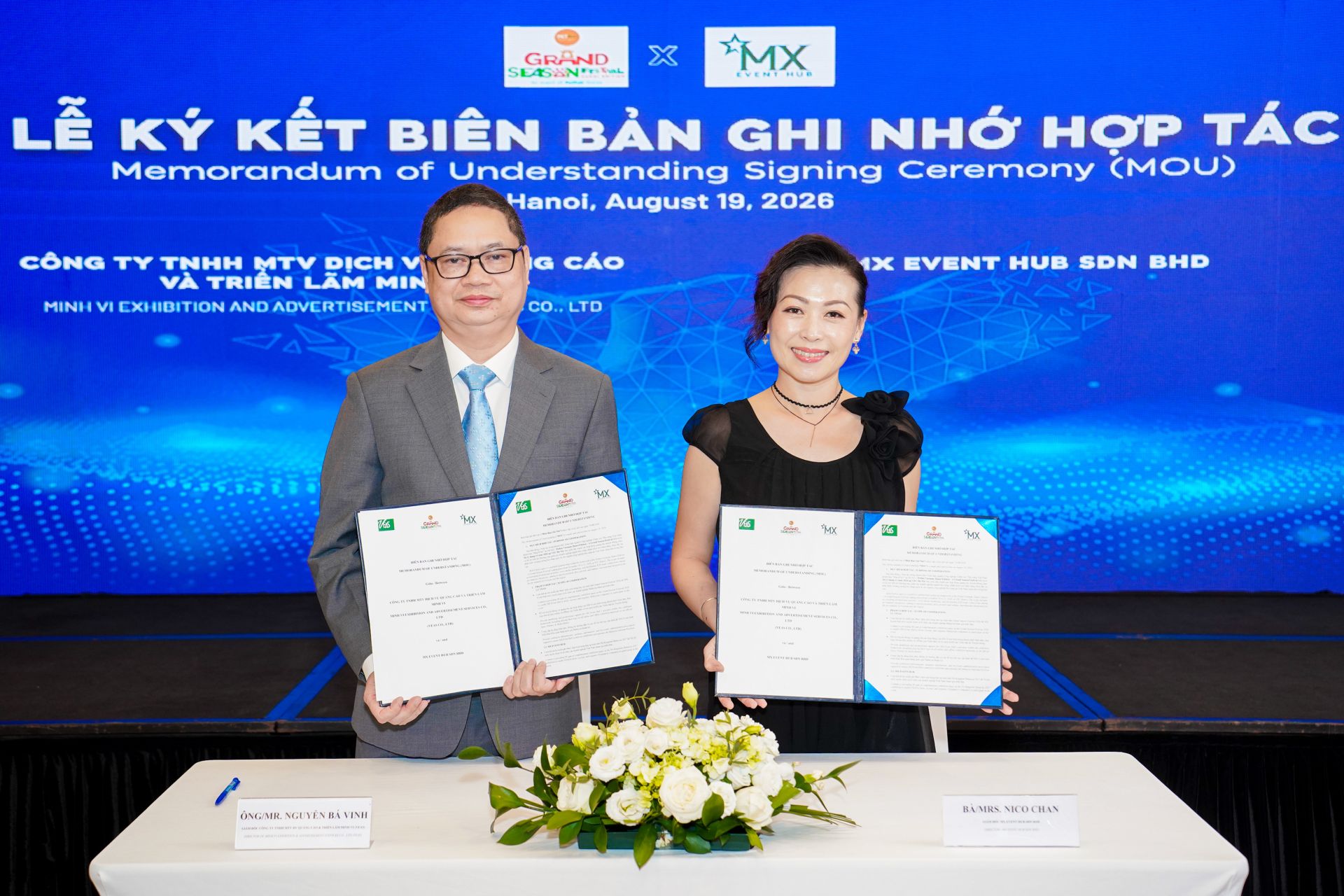 Ông Nguyễn Bá Vinh, Giám đốc Đại diện Công ty Minh Vi và bà Nico Chan, Giám đốc MX Event Hub Sdn Bhd, đại diện hai bên ký kết MOU Ông Nguyễn Bá Vinh, Giám đốc Đại diện Công ty Minh Vi và bà Nico Chan, Giám đốc MX Event Hub Sdn Bhd, đại diện hai bên ký kết MOU