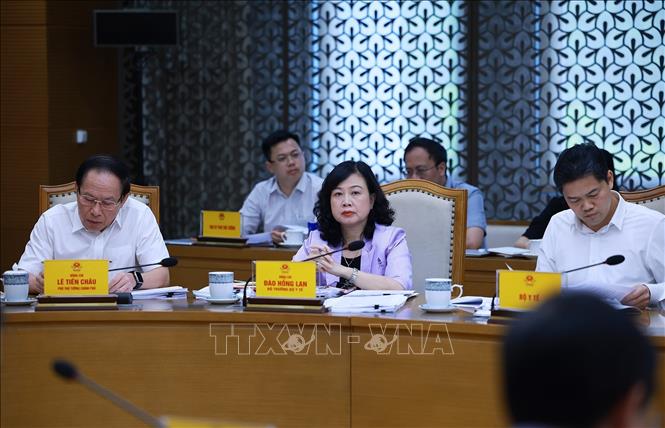 L&atilde;nh đạo Bộ Y tế tham dự buổi l&agrave;m việc. Ảnh: Dương Giang/TTXVN
