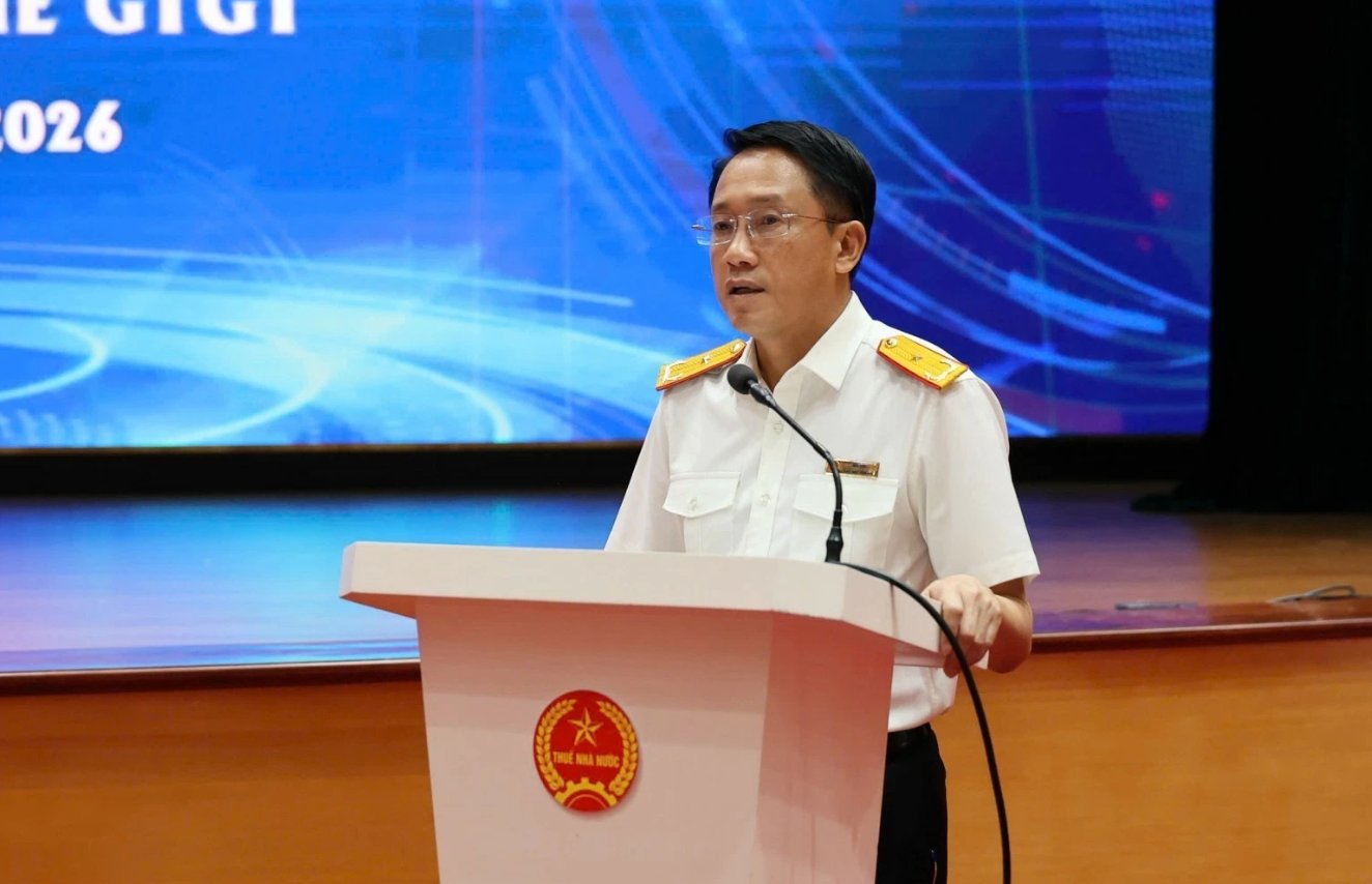 &Ocirc;ng Mai Sơn, Ph&oacute; cục trưởng Cục Thuế, Bộ T&agrave;i ch&iacute;nh ph&aacute;t biểu tại hội nghị. Ảnh: gdt.gov.vn